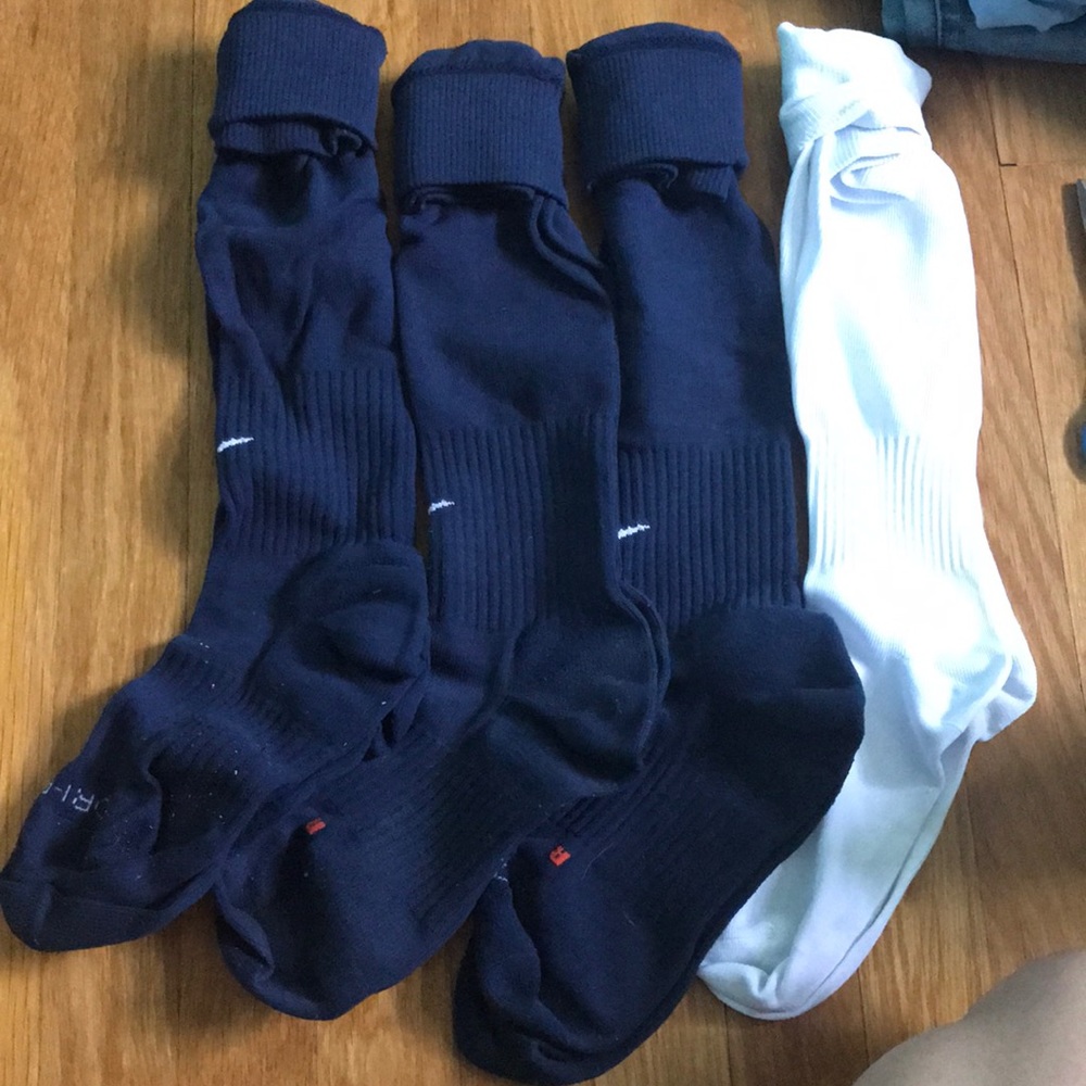 (3) Nike soccer socks + 1 no name freebie